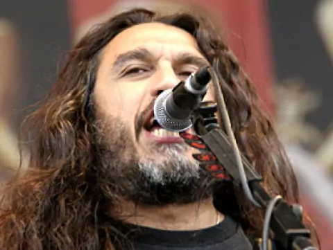 Том Арайа — Американский рок-музыкант, бас-гитарист, член группы "Slayer"